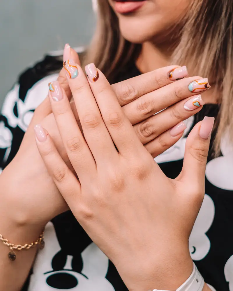 Custom nail art with hand-painted detail
